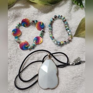 Handmade bracelets and white pendant necklace